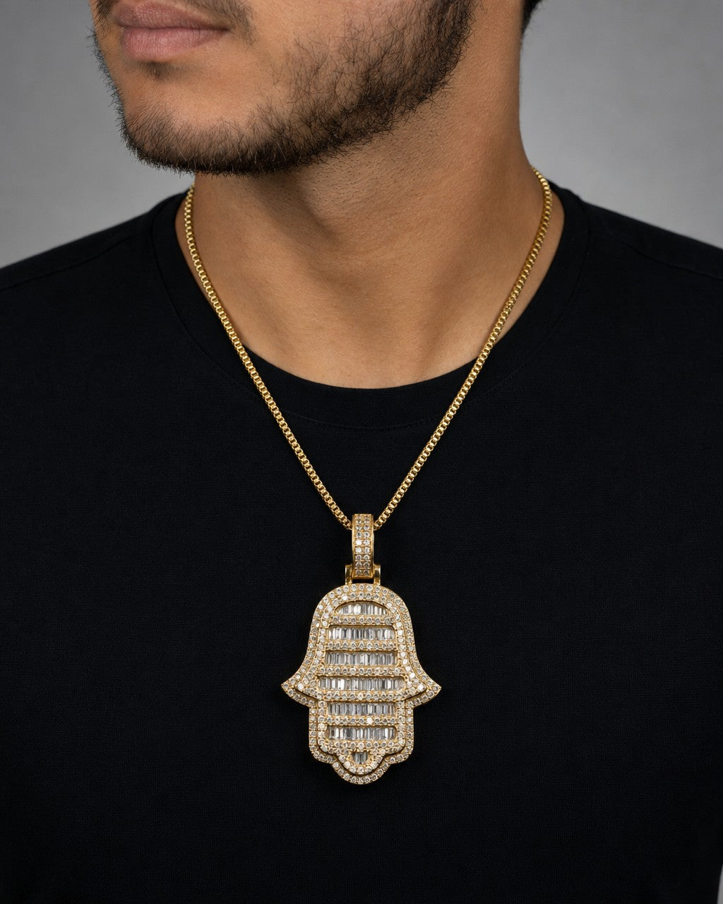 Male model wearing 14K Hamsa Diamond Baguette Pendant