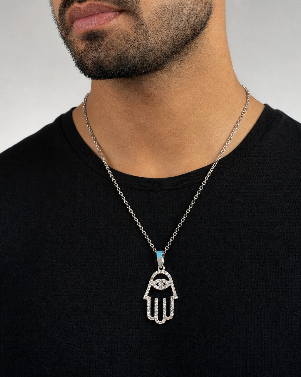 Male model wearing 14K Small Hamsa Diamond Pendant
