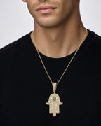 Male model wearing 14K Hamsa Green Eye Diamond Pendant