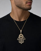 Male model wearing 14K Hamsa Evil Eye Diamond Pendant