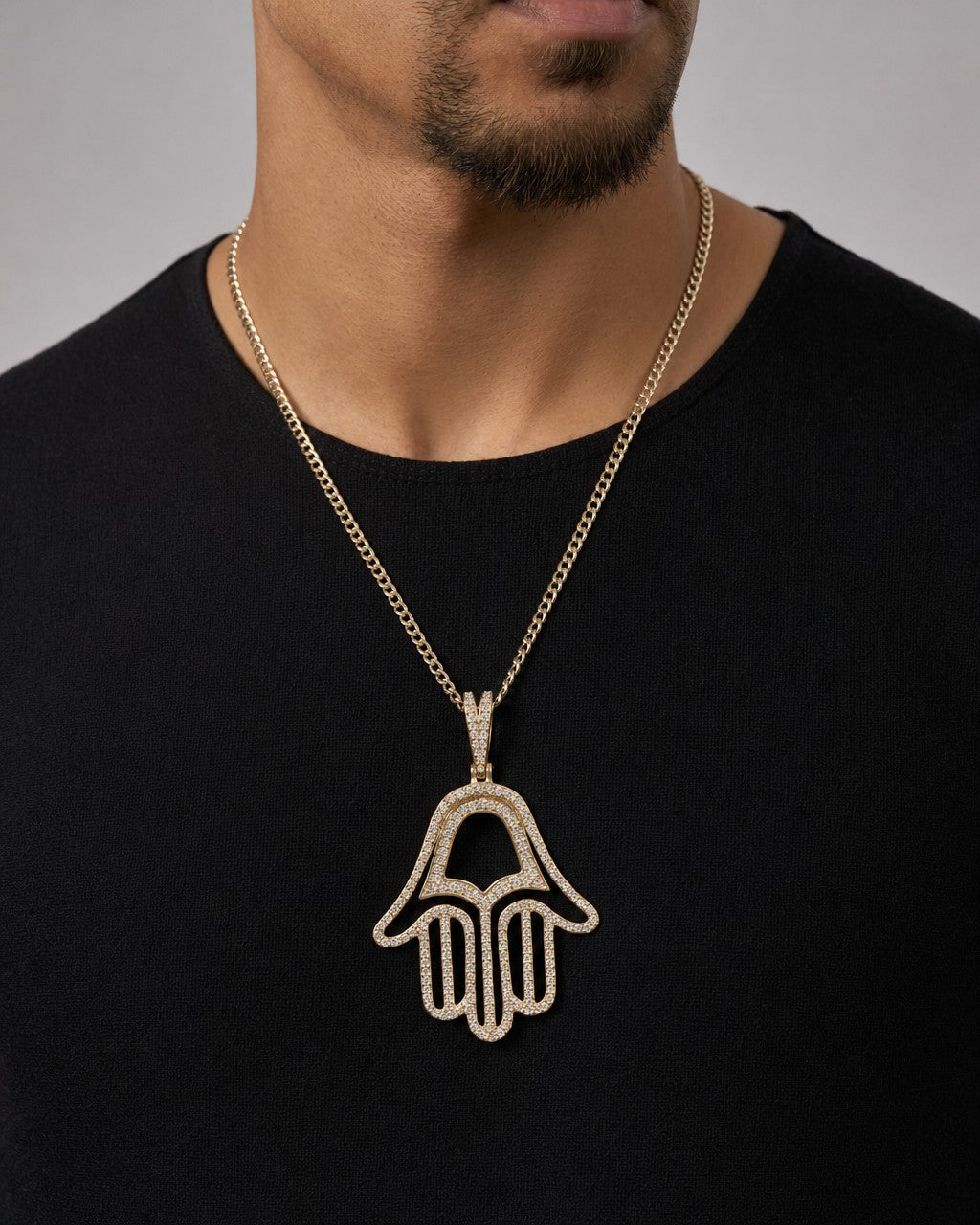 Male model wearing 14K Hamsa Diamond Pendant