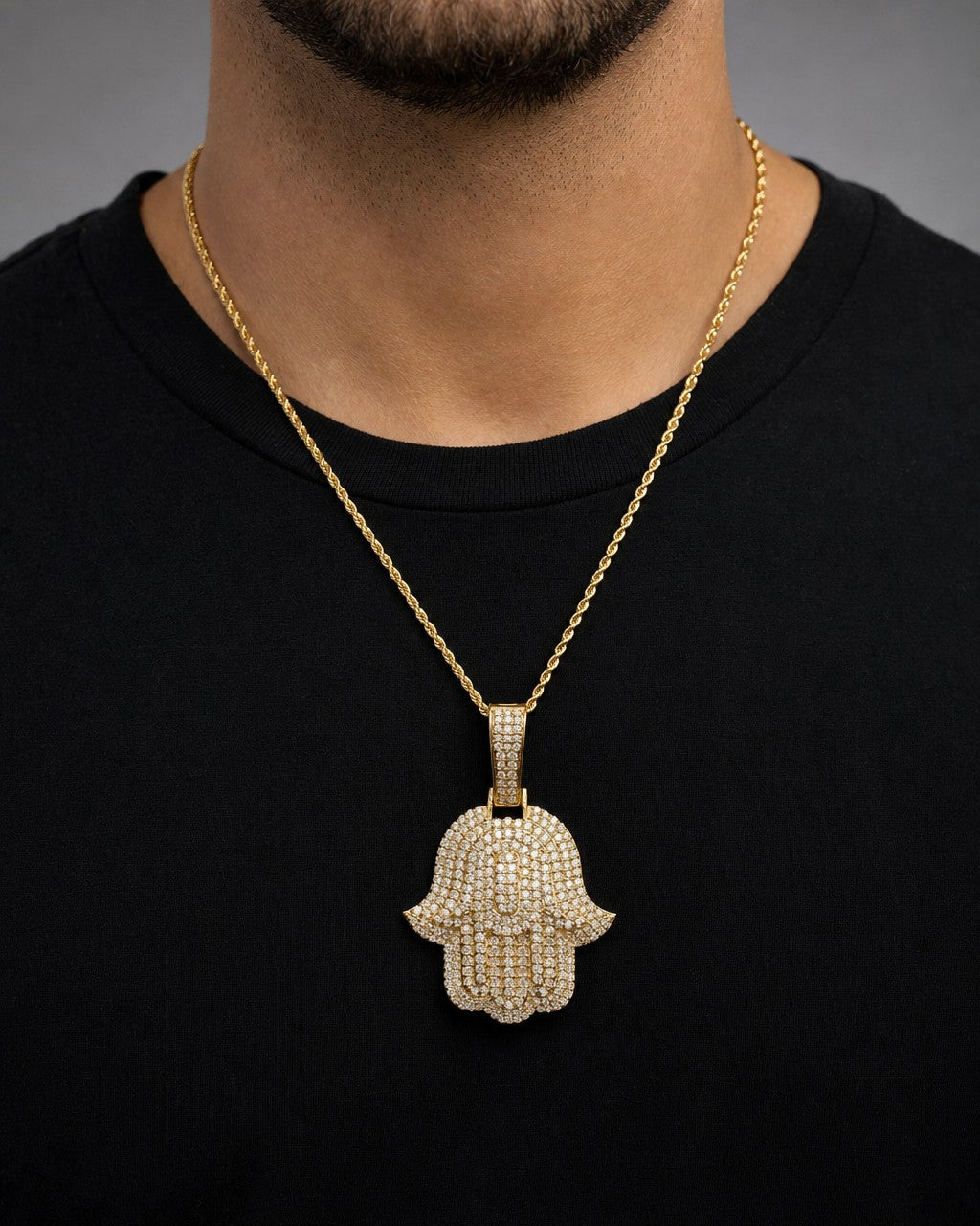Male model wearing 14K Hamsa Diamond Pendant