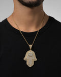 Male model wearing 14K Hamsa Diamond Pendant
