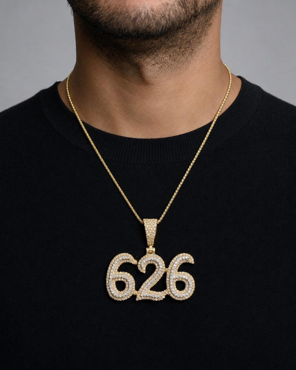 Male model wearing 14K 626 Area Code Diamond Pendant