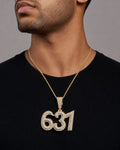 Male model wearing 14K 631 Area Code Diamond Pendant