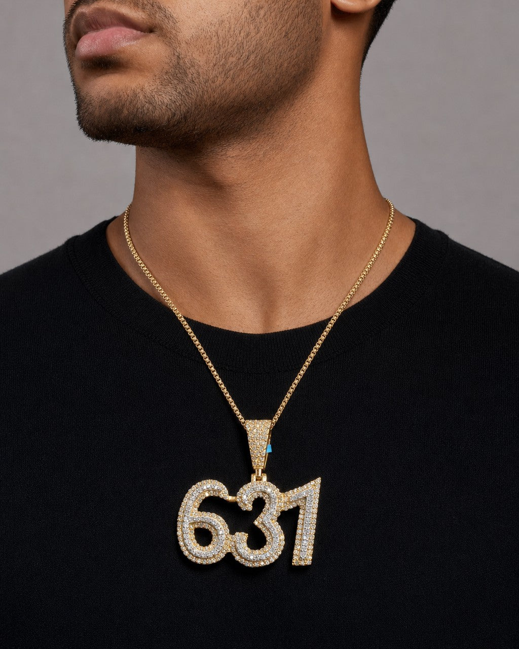 Male model wearing 14K 631 Area Code Diamond Pendant