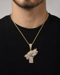 Male model wearing 14K Money Hand Diamond Pendant