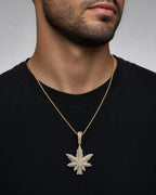 Male model wearing 14k Yellow Gold Weed Diamond Pendant