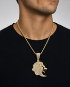 Male model wearing 14K Lion Head Diamond Pendant