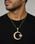 Male model wearing 14K Star Moon Diamond Pendant