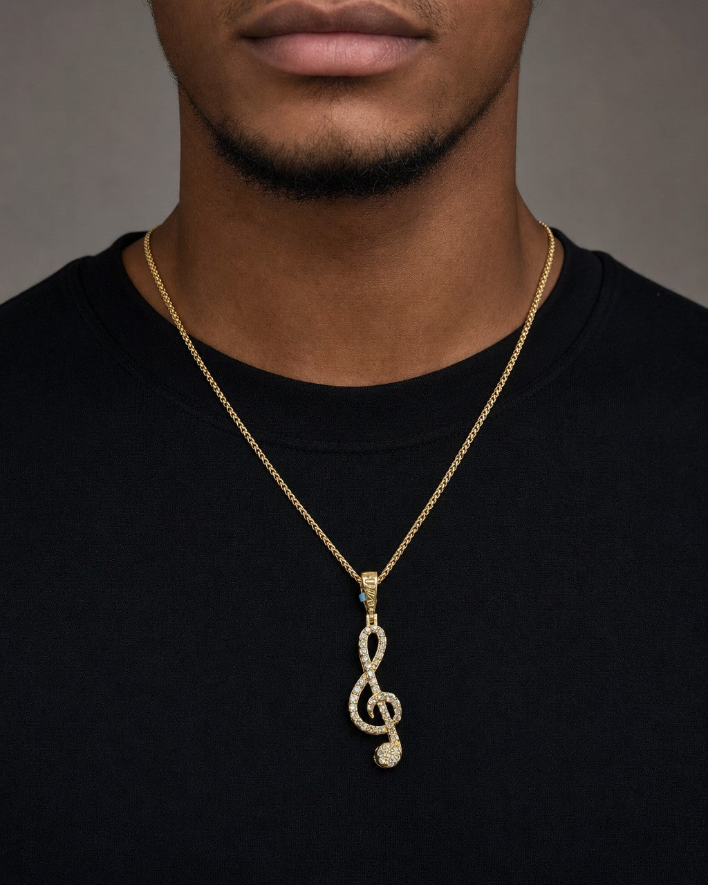 Male model wearing 14K Eighth Music Note Diamond Pendant