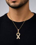Male model wearing 14K Breast Cancer Awareness Ribbon Diamond Pendant