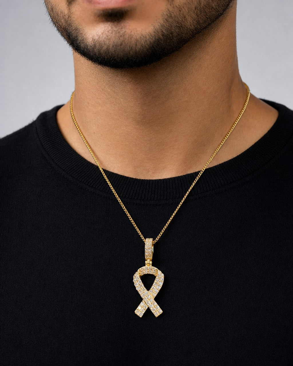 Male model wearing 14K Breast Cancer Awareness Ribbon Diamond Pendant