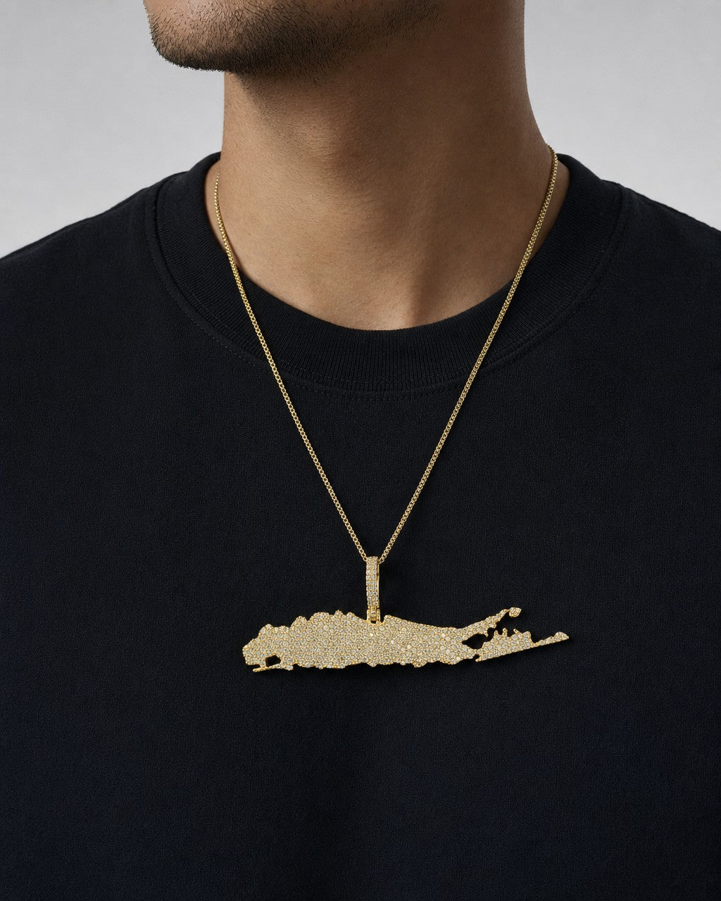 Male model wearing 14K Long Island Diamond Pendant