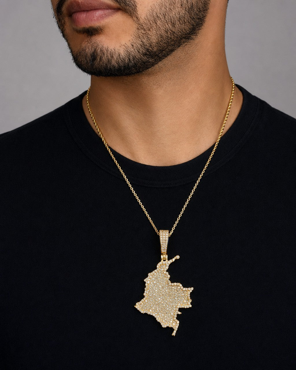 Male model wearing 14K Colombia Diamond Pendant