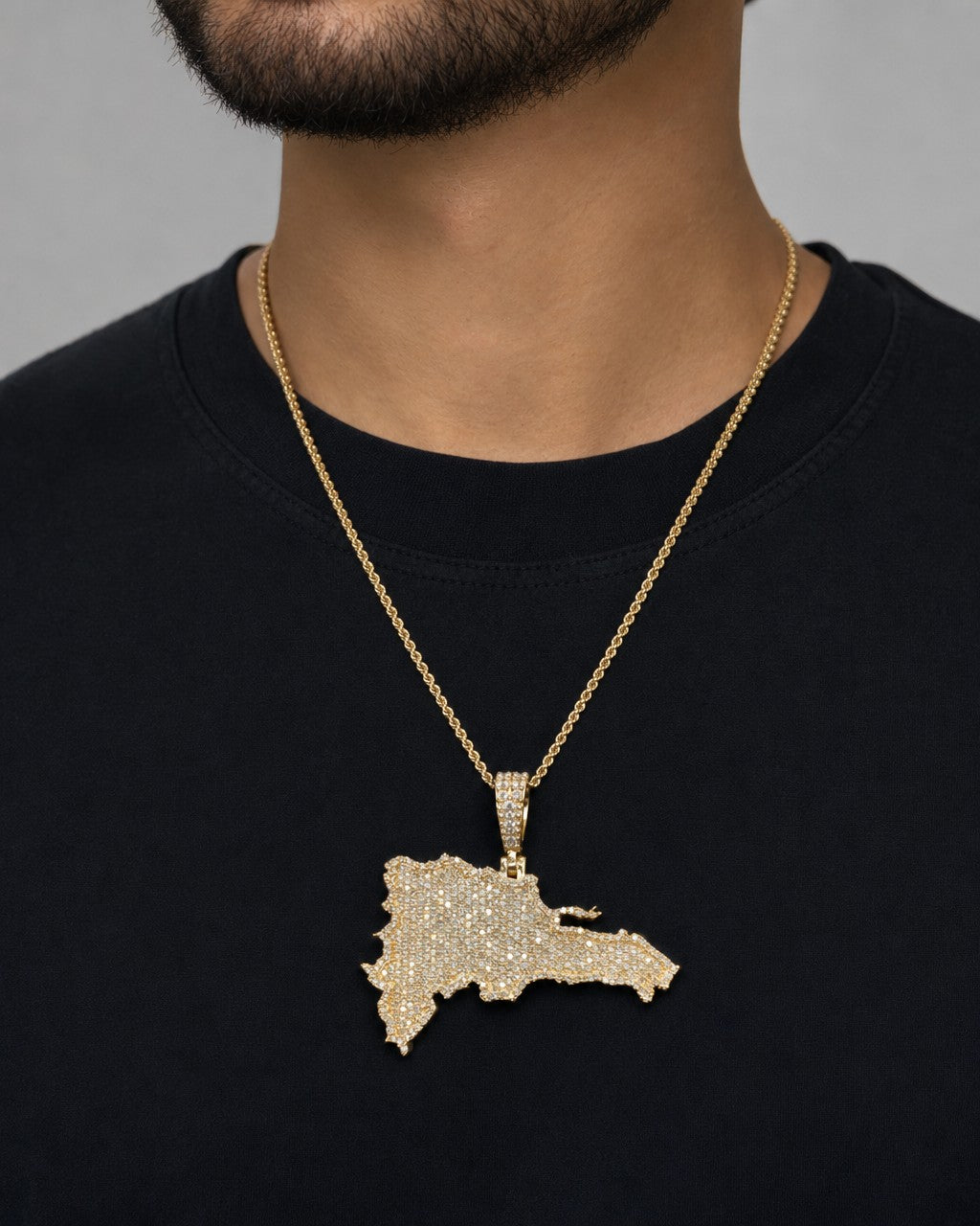 Male model wearing 14k Dominican Republic Pendant
