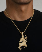 Male model wearing 14K Sagittarius Diamond Pendant 1.5ct