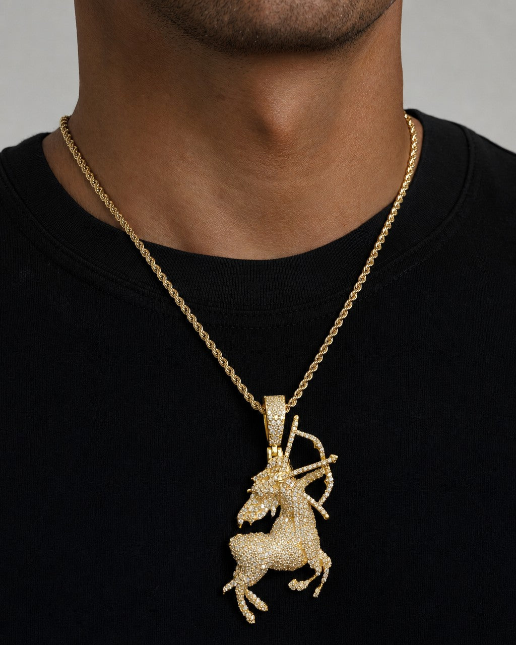 Male model wearing 14K Sagittarius Diamond Pendant 1.5ct