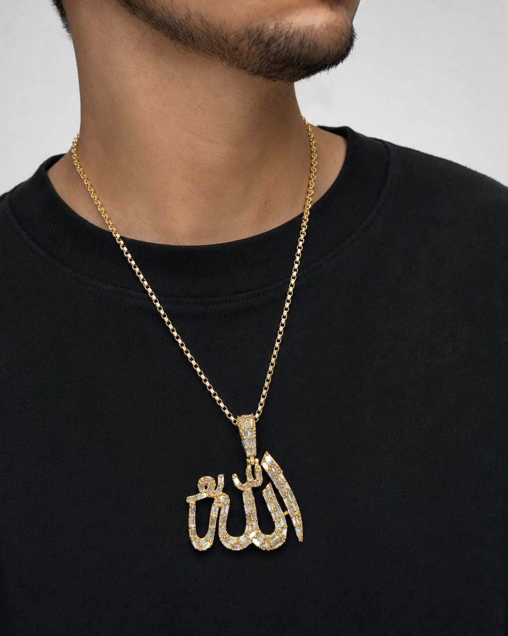 Male model wearing 14K Yellow Allah Pendant