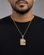 Male model wearing 14k Trap House Pendant