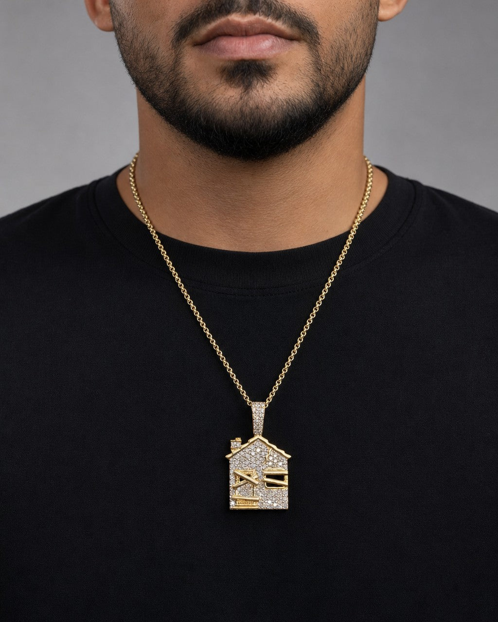 Male model wearing 14k Trap House Pendant