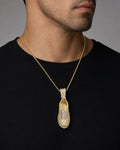 Male model wearing 14K Shoe Diamond Pendant