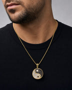 Male model wearing 14k Yin and Yang Pendant