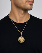 Male model wearing 14K Soccer Ball Diamond Pendant