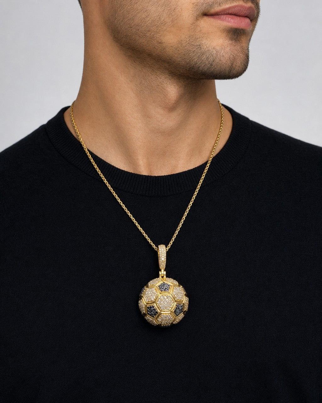 Male model wearing 14K Soccer Ball Diamond Pendant