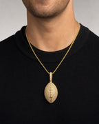 Male model wearing 14K Football Diamond Pendant