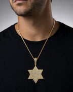Male model wearing 14k Star Pendant