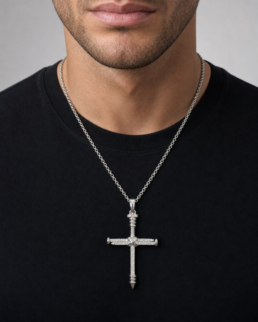 Male model wearing 14K Nail Cross Diamond Pendant