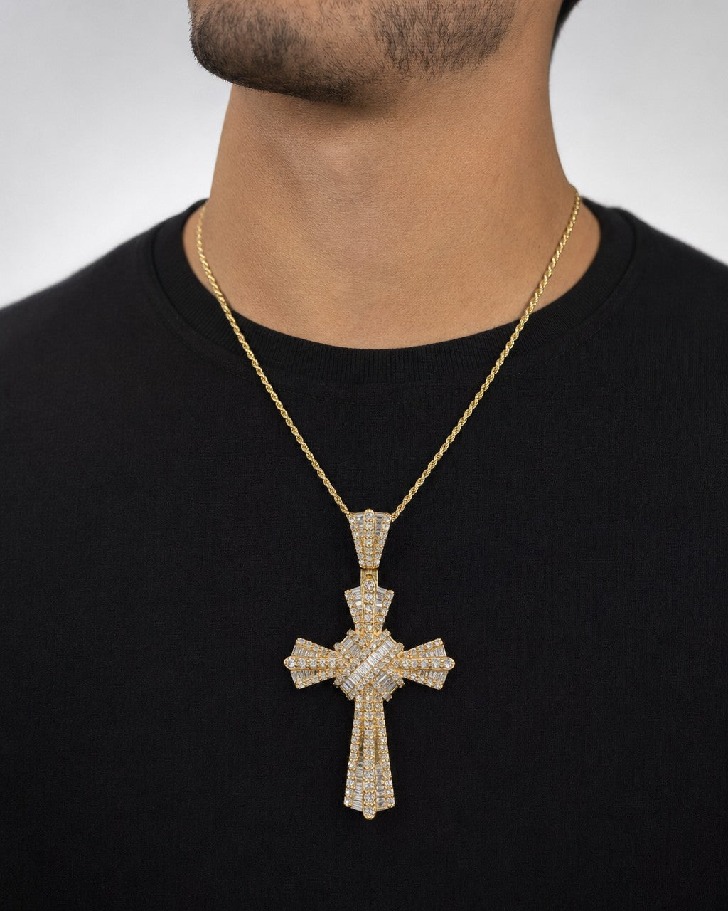 Male model wearing 14k Latin Cross Baguette Pendant
