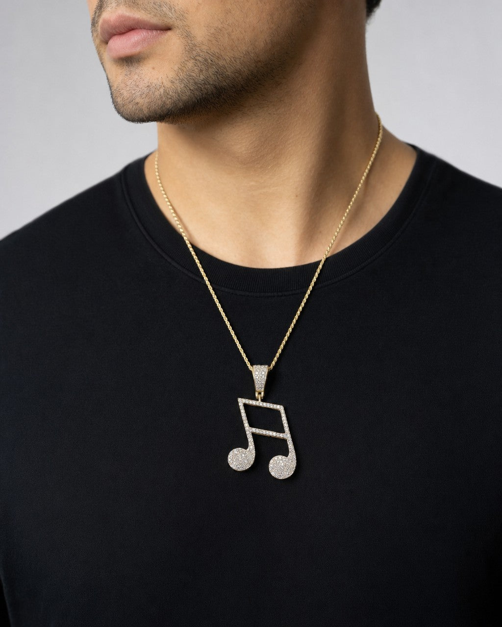 Male model wearing Sixteenth Music Note Pendant
