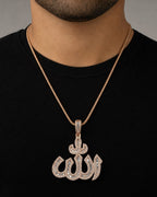 Male model wearing 10K Rose Gold Allah Baguette Pendant
