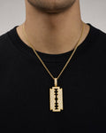 Male model wearing Razor Pendant