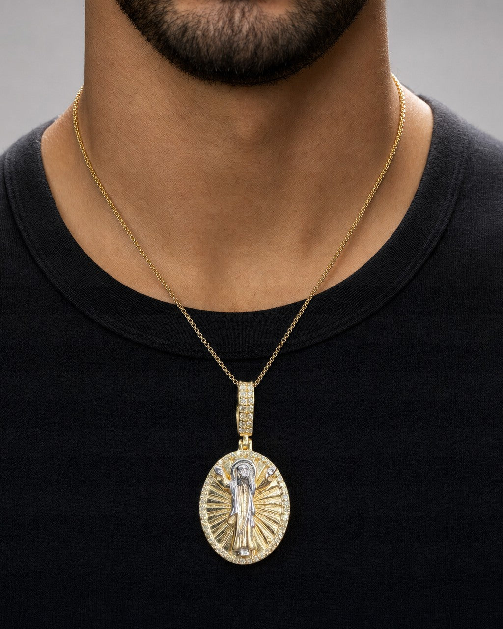 Male model wearing 10K Jesus Save Us Medal Diamond Pendant