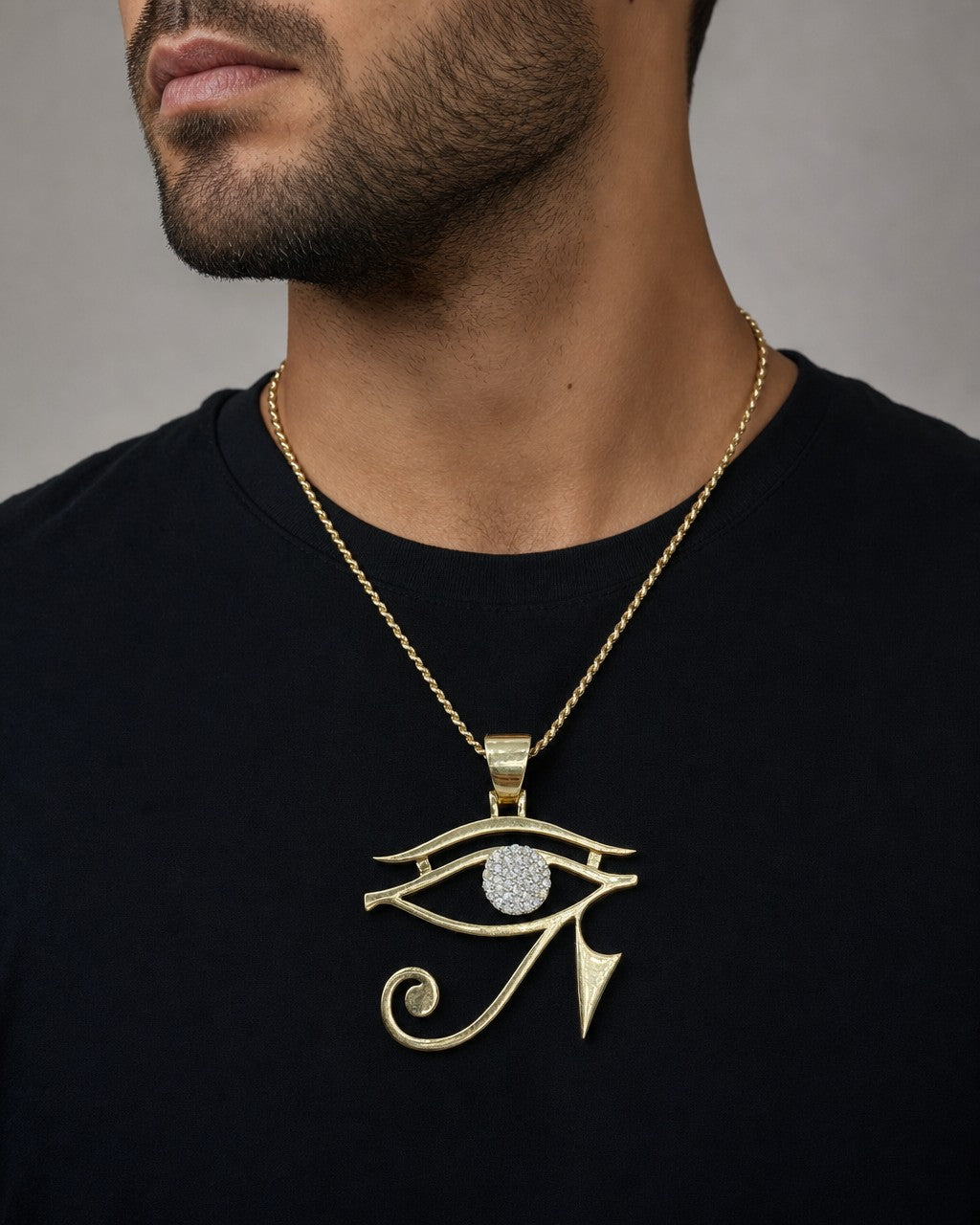 Male model wearing 10K Egyptian Eye Pendant
