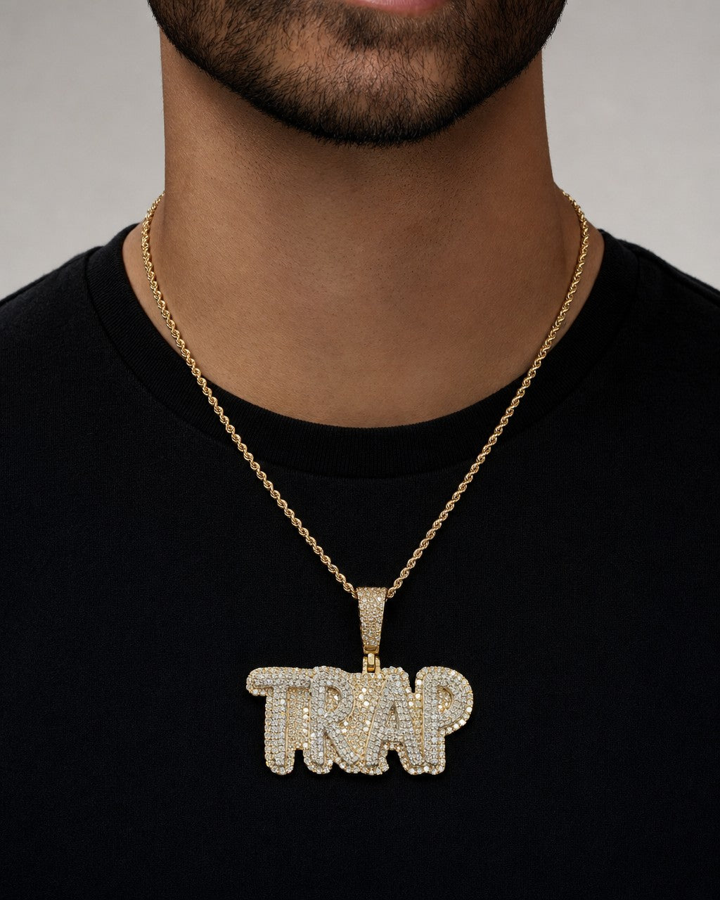 Male model wearing Trap Name Pendant
