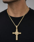 Male model wearing 10K Square Budded Cross Diamond Pendant