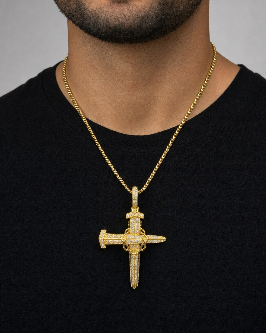 Male model wearing 10K Nail Cross Diamond Pendant