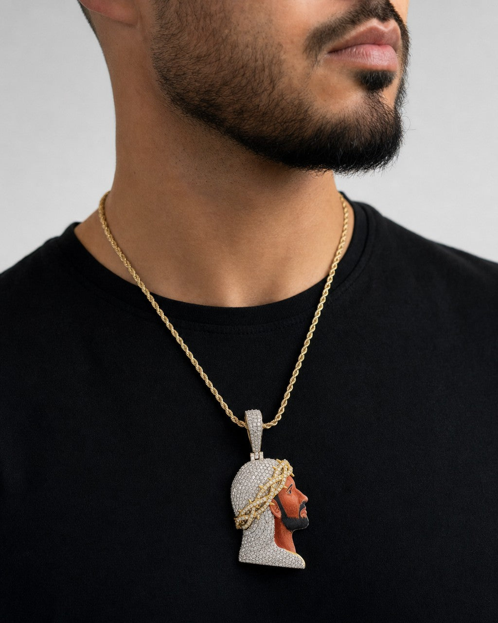 Male model wearing 10K Jesus Head Enamel Diamond Pendant