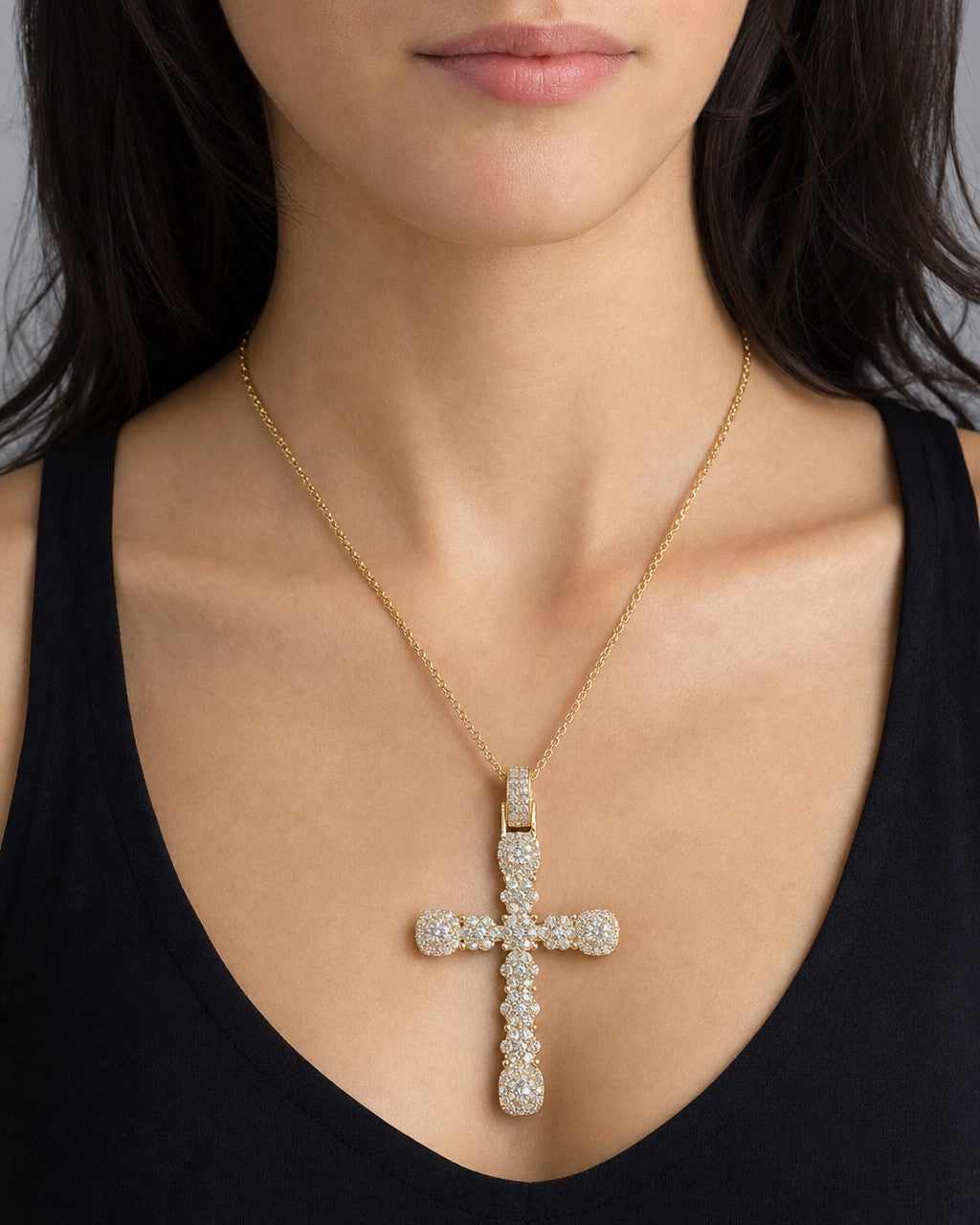 Female model wearing 10K Flower Cross Diamond Pendant