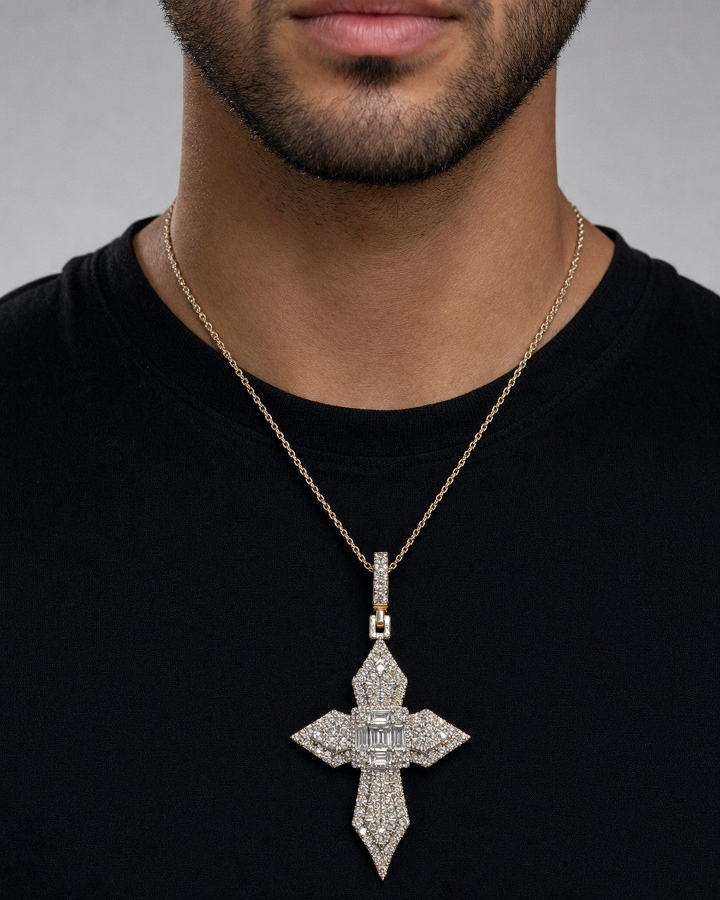 Male model wearing 10K Byzantine Cross Diamond Baguette Pendant