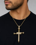 Male model wearing 10K Nail Cross Diamond Pendant