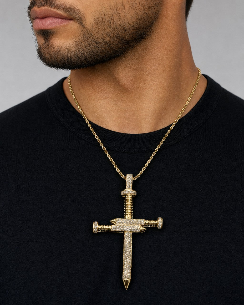 Male model wearing 10K Nail Cross Diamond Pendant