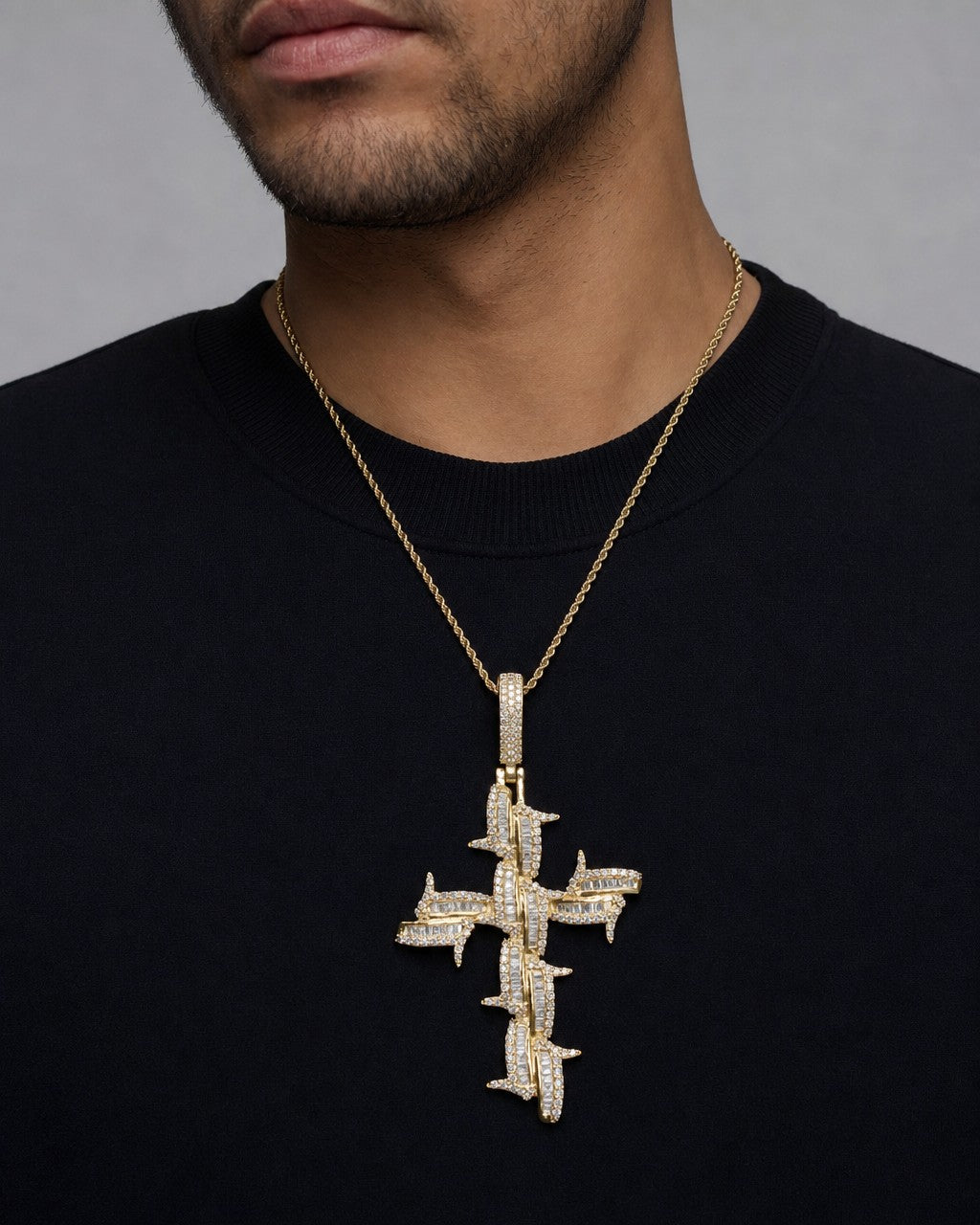 Male model wearing 10K Holy Spirit Cross Diamond Baguette Pendant