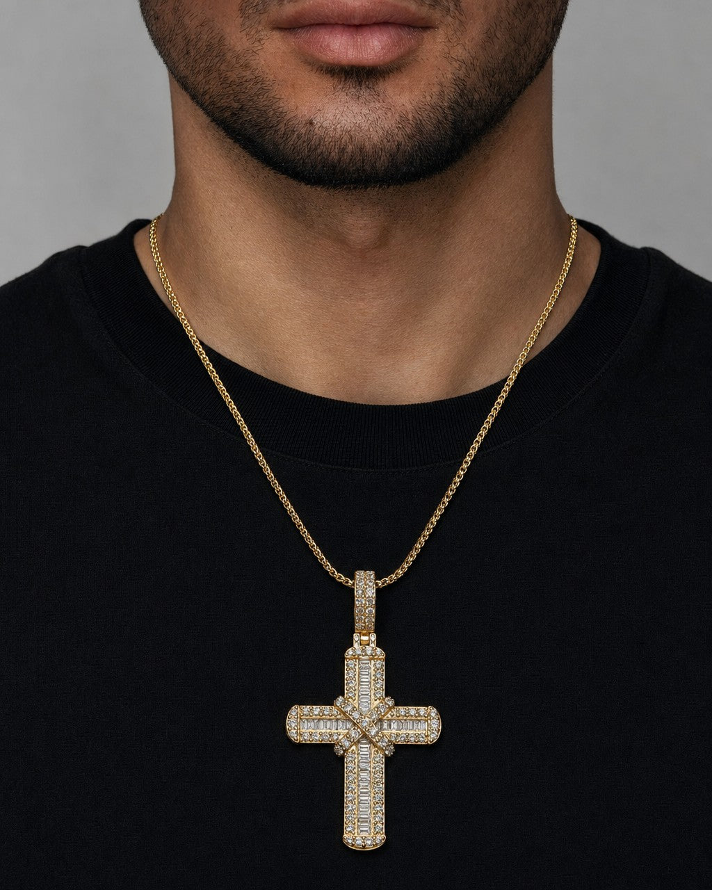 Male model wearing 10K Knot Diamond Cross Pendant