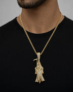 Male model wearing 10K Santa Muerte Grim Reaper Diamond Pendant