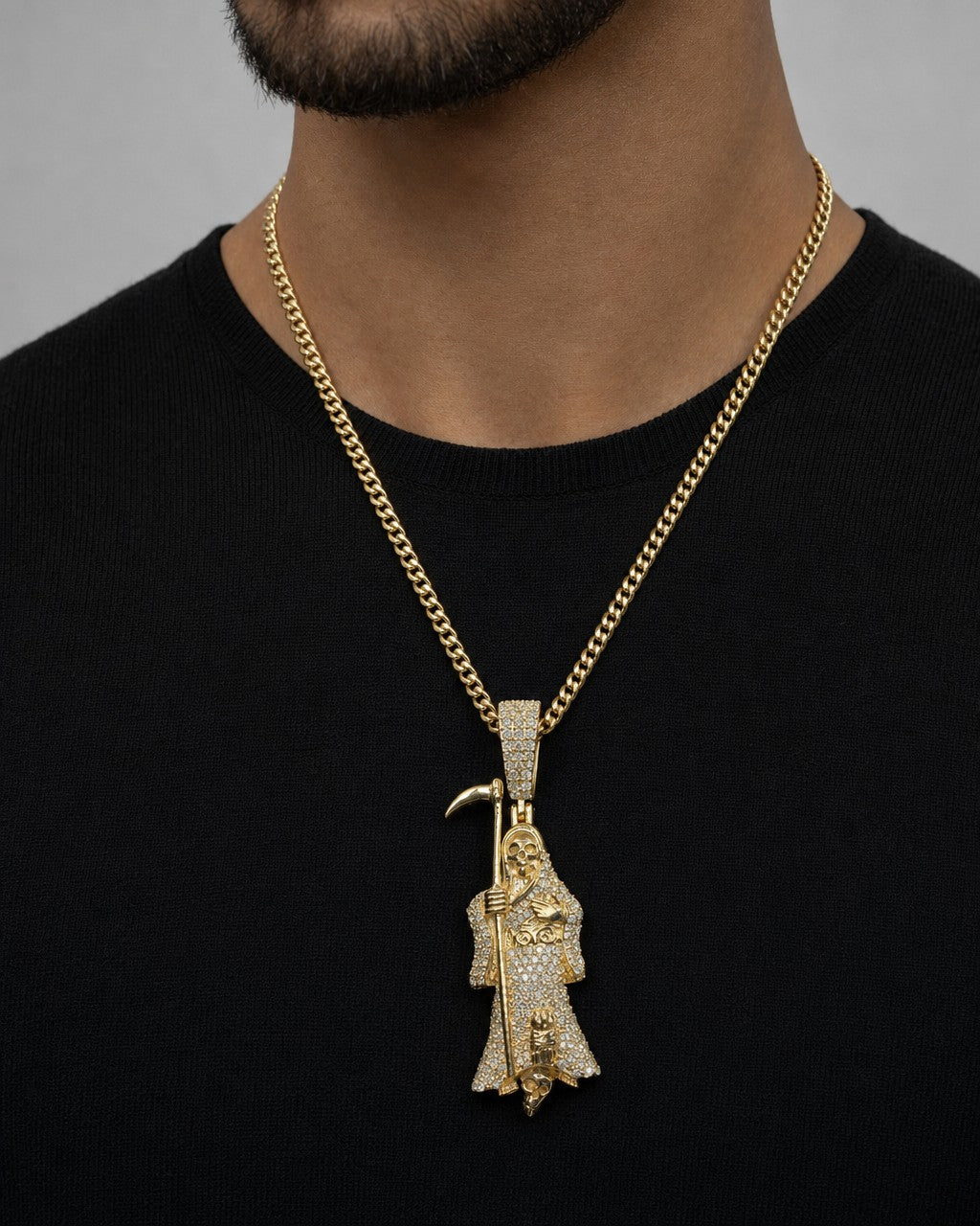 Male model wearing 10K Santa Muerte Grim Reaper Diamond Pendant